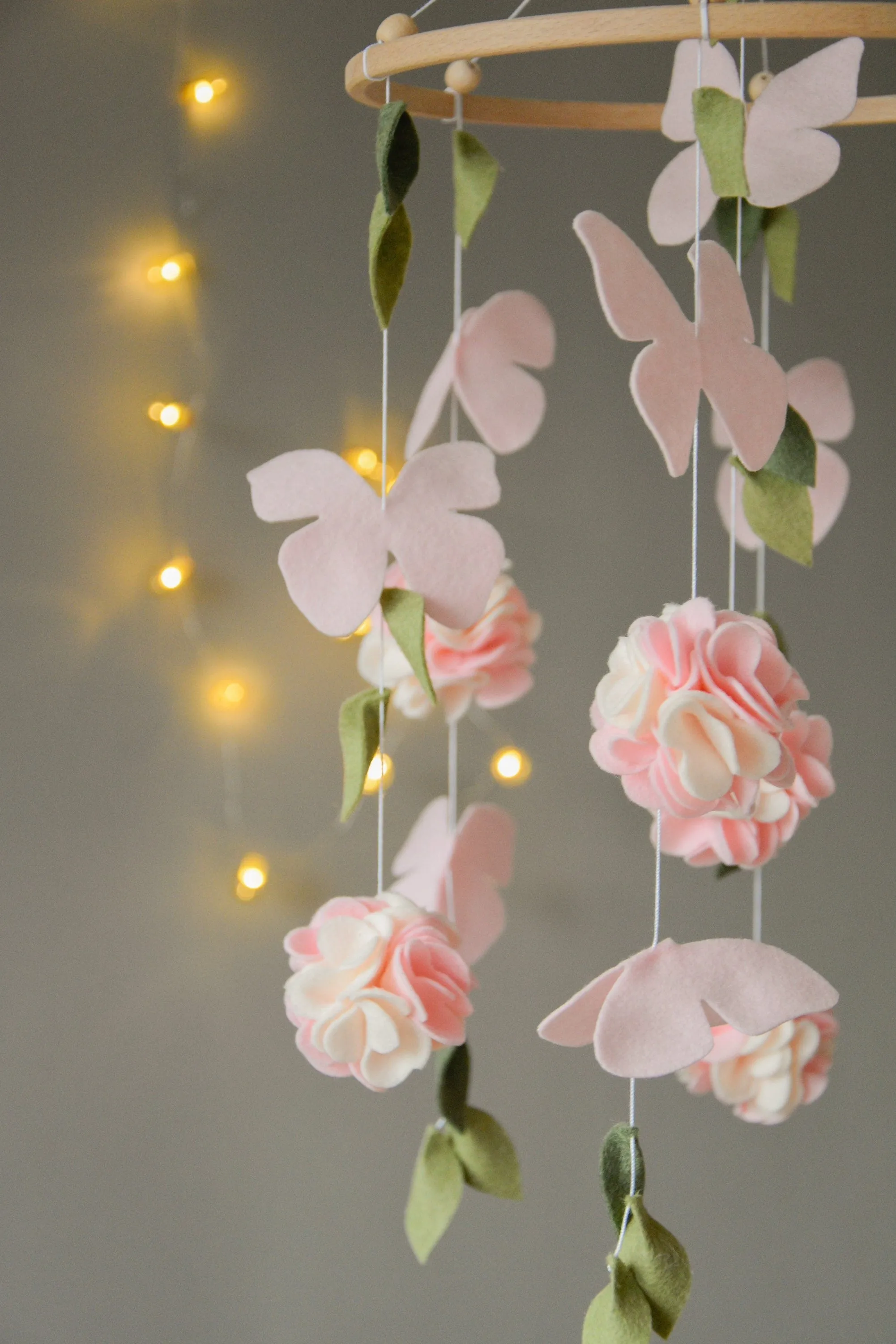 Floral mobile with flower, butterfly and leaves